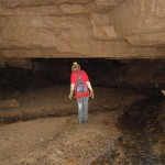Caitlyn in the stream passage in White Cricket Cave