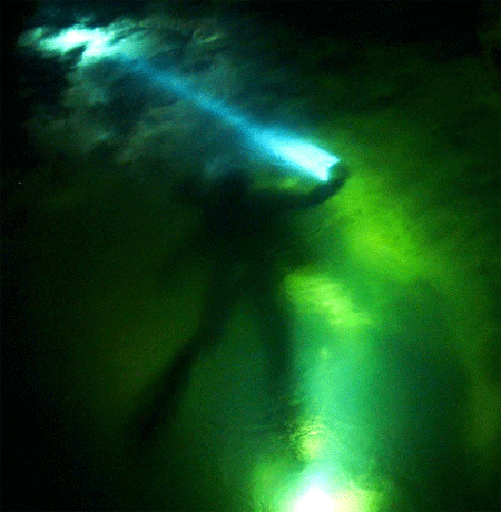 Jason and Cindy illuminate the underwater passage at Peggy's Pond