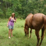 Stephanie showing off her horse whispering skills