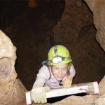 Caitlyn climbing down the first ladder