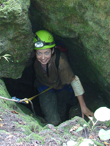 Marsha climbing out the entrance of The Catacombs