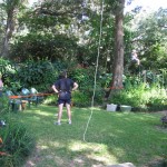 Bill Birdsall's backyard. The group watches in awe as Bill Walker climbs... ...about 50' and then quits.