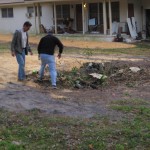 Bill Birdsall and Sean Roberts inspecting the small hole.